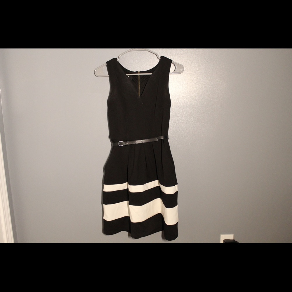 Formal black and white dress with belt and pockets